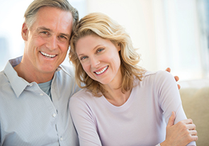 A couple smiling. Linka to Gifts of Appreciated Securities